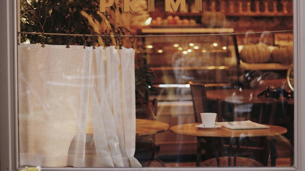 Window seat inside Maison Bette looking onto a Guildford street, fictional café interior